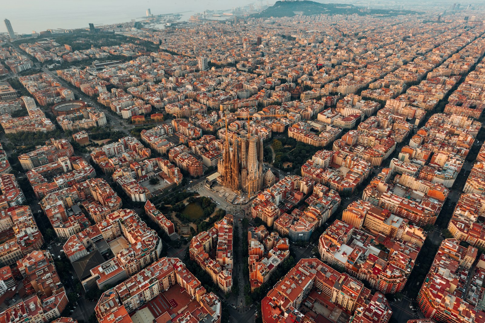 Barcelona rooftops and Sagrada Família at golden hour